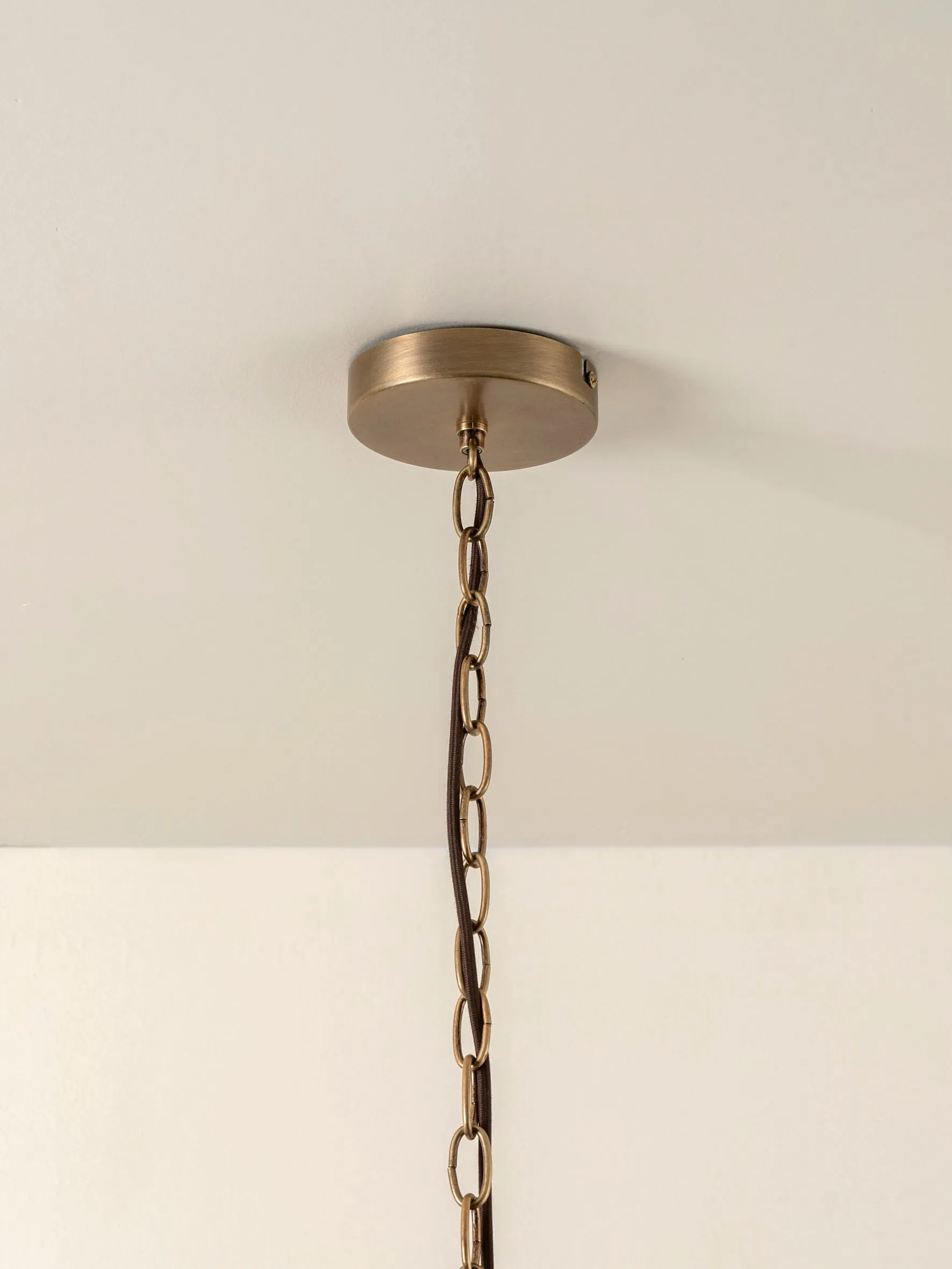 Waverly - 6 light aged brass and white porcelain pendant